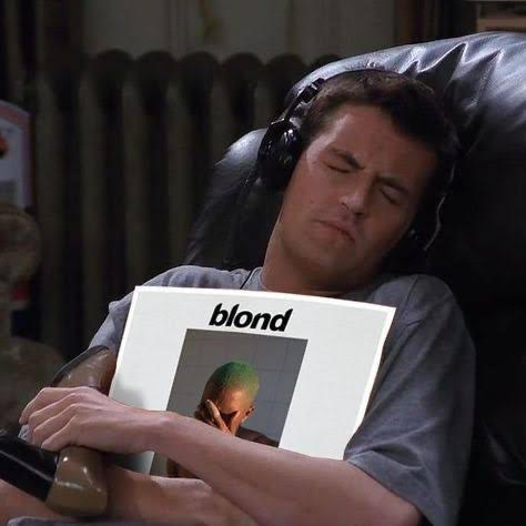 A meme of Chandler from Friends clutching the record 'blond' by Frank Ocean